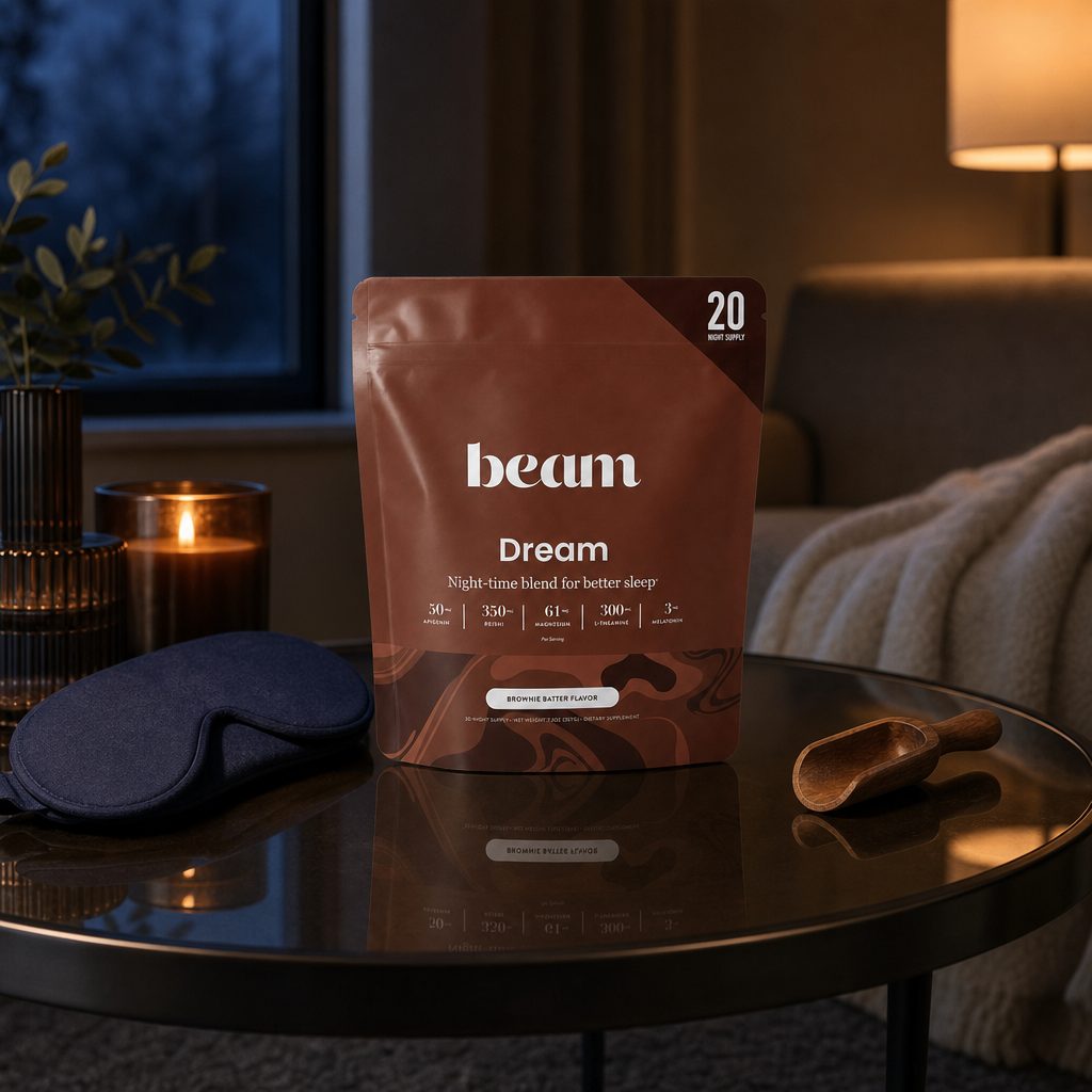 Beam Dream Powder Brownie Batter pouch beside a prepared mug of cocoa
