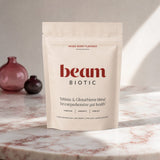 Beam Biotic Mixed Berry carton and stick packs arranged with mixed berries