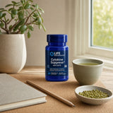 Life Extension Cytokine Suppress with EGCG bottle on a kitchen counter with a glass of water