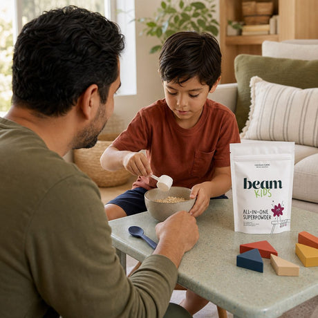 Beam Kids All-In-One Superpowder Chocolate scoop and powder displayed beside the tub