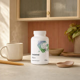 Thorne Research Glycine 250 Capsules bottle displayed on a clean countertop
