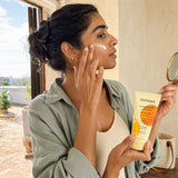 Mad Hippie Luminizing Facial SPF tube with cream texture and subtle shimmer swatch
