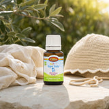 Carlson Baby's Super Daily D3 Drops 400 IU bottle with baby care items on a nursery surface