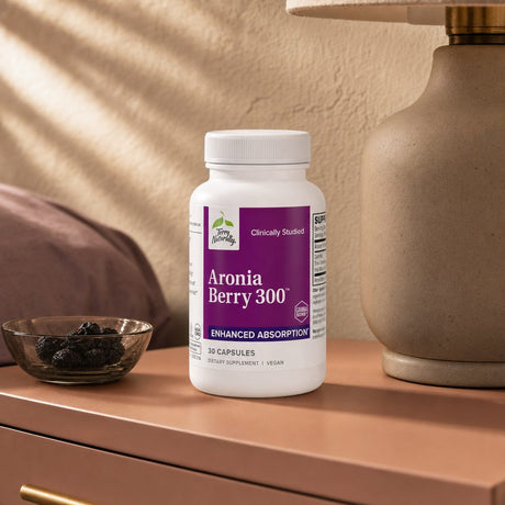 Terry Naturally Aronia Berry 300 bottle on white background with vegan and Non-GMO label details