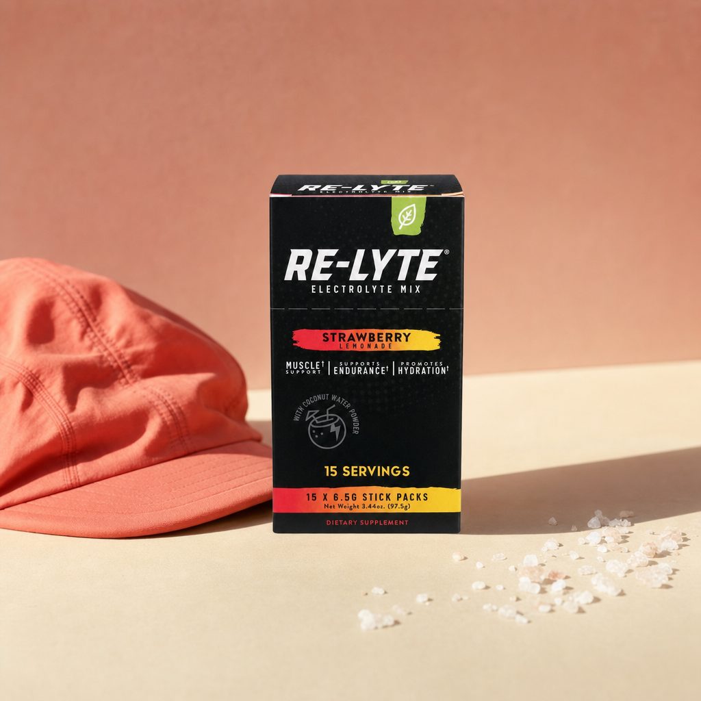 Redmond Re-Lyte Strawberry Lemonade stick pack mixed into a water bottle