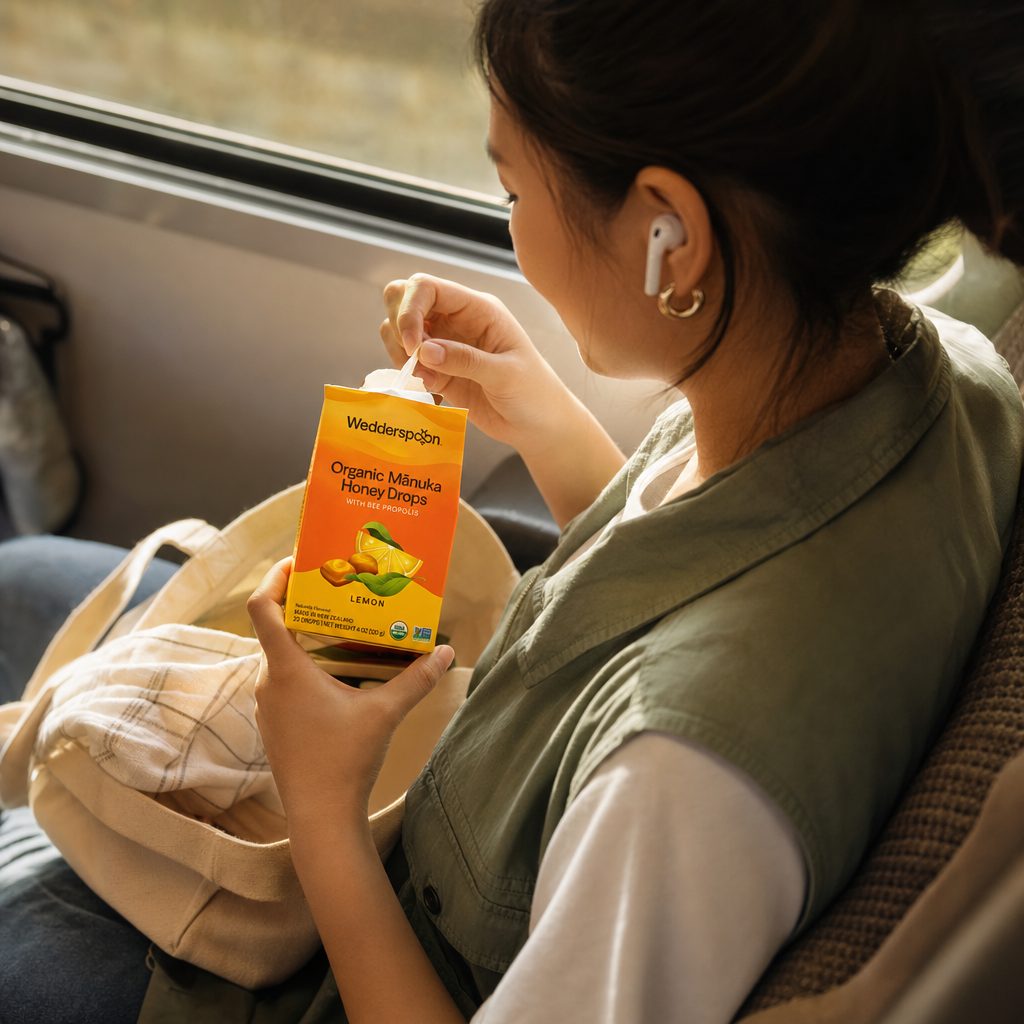 Wedderspoon Organic Mānuka Honey Drops Lemon side package noting no artificial colors or preservatives