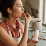 Integrative Therapeutics NAC Capsules bottle with a single capsule on a clean surface