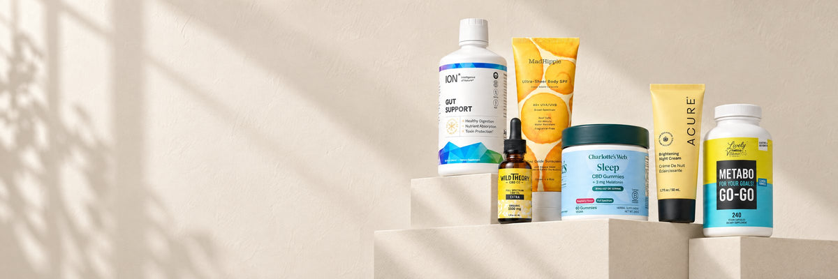 ION Gut Support, Wild Theory CBD oil, Mad Hippie SPF, Charlotte's Web Sleep gummies, Acure night cream and Lively Metabo Go-Go on stone pedestals