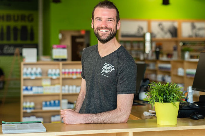 Tim O'Brien, founder of The Healthy Place, at the counter of the Fitchburg store